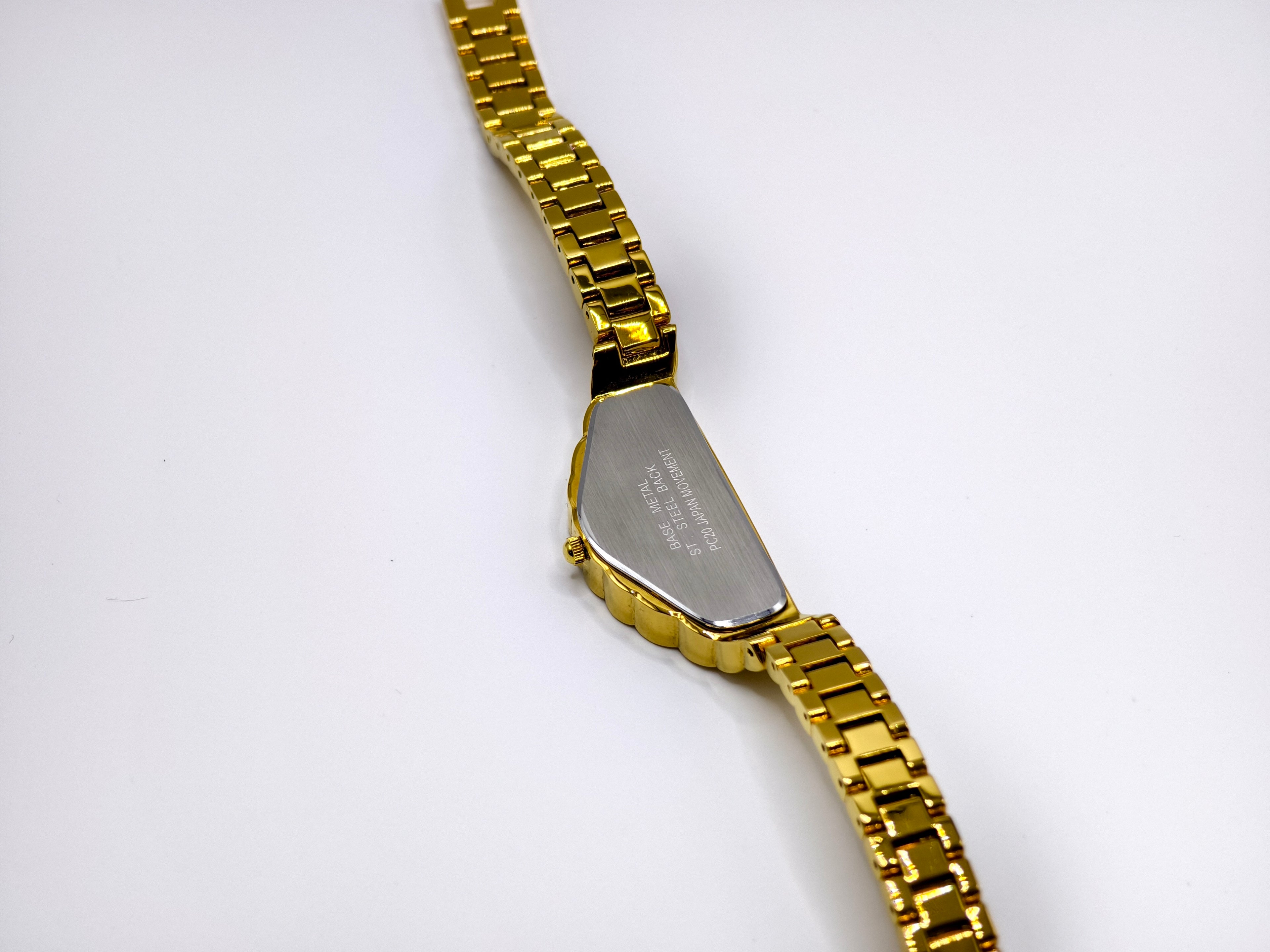 Vintage Seiko Halfmoon Asymmetrical Quartz Watch – Gold Tone & Black Dial