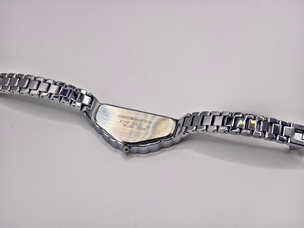 Vintage Seiko Halfmoon Asymmetrical Quartz Watch – Silver Tone & Gold Dial