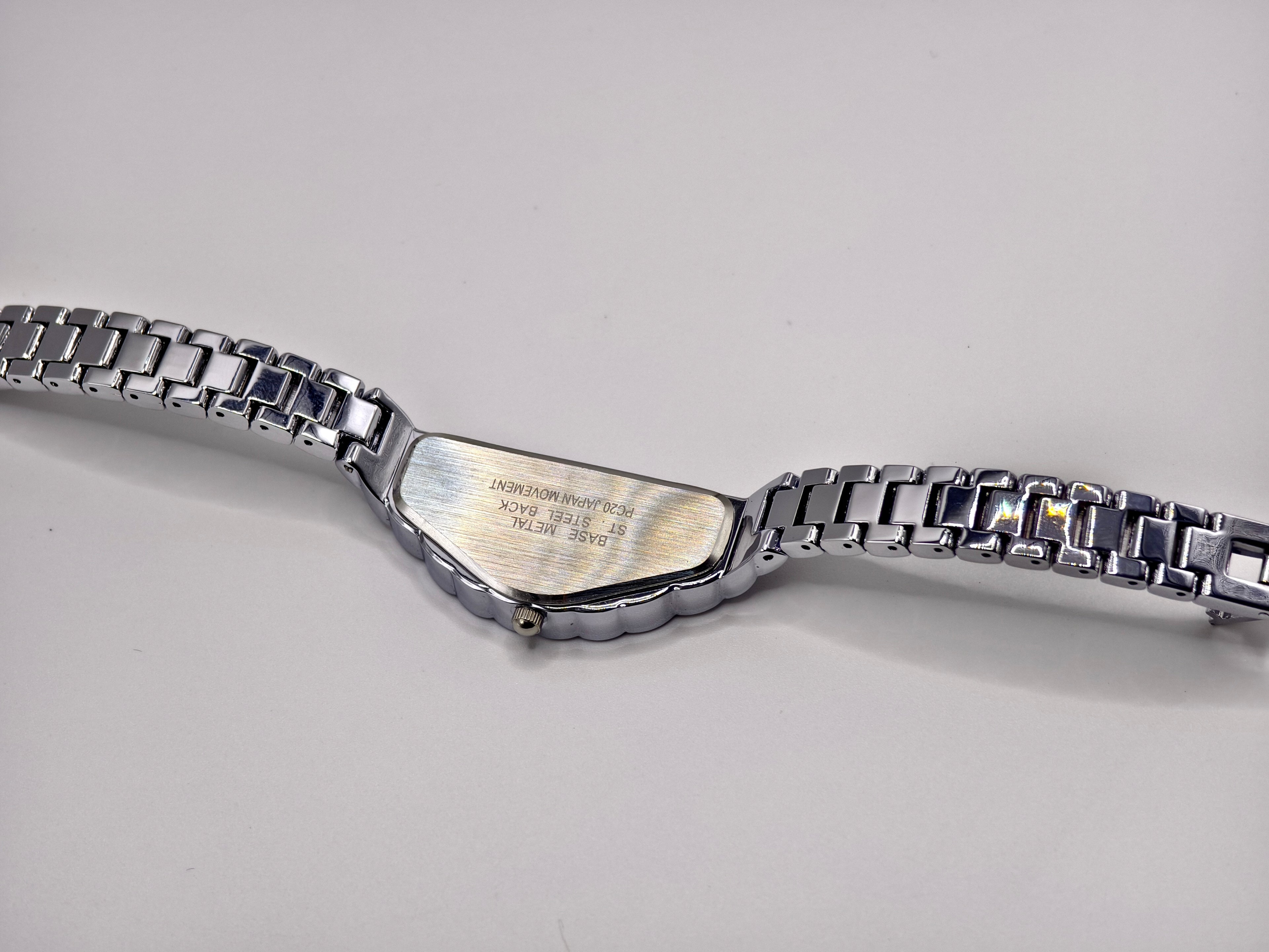 Vintage Seiko Halfmoon Asymmetrical Quartz Watch – Silver Tone & Gold Dial