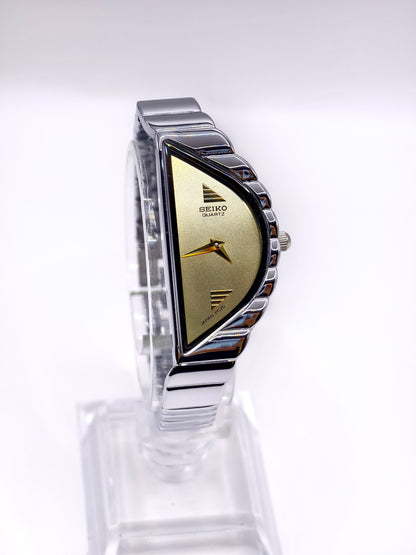 Vintage Seiko Halfmoon Asymmetrical Quartz Watch – Silver Tone & Gold Dial
